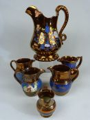 Victorian copper lustre jugs of varying sizes. (6)