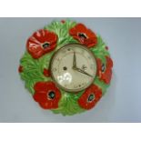 West German Pottery clock the outer decorated as Poppies.