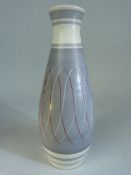 Poole Pottery Freeform bud vase in the PRP pattern. Approx height - 19cm