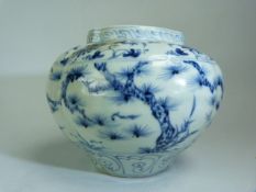 Chinese blue and white squat vase. Depicting blossomed trees with trailing floral borders. No