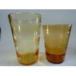 Amber Glass - pair of Ribbed Glass Vases - Both unmarked and approx heights - 20cm and 17cm.