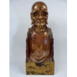 Antique wooden oriental Deity figure - possible from a religious building. Hand carved depicting a