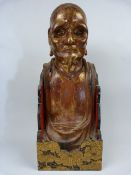 Antique wooden oriental Deity figure - possible from a religious building. Hand carved depicting a