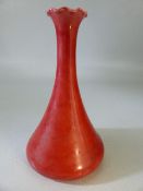 Burmantofts Red glazed ceramic vase of small form with crimped neck. Approx height 16cm Stamped with