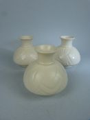 Spode's Velamour small bud vases decorated in cream glaze - Moulded in relief with foliage. Designed