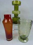 Holmgaard green glass vase along with a Red Holmgaard vase and one other.