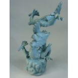 RU WARE - Figure depicting a five toed dragon in a Celadon glaze. 5 stud marks to base