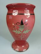 Wedgwood Veronese Ware footed vase on a Wine red ground. Impressed marks to base. Approx height -