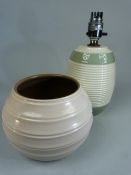 Modern Twintone Poole Pottery lamp base and a similar Twintone Ribbed Poole squat vase. (2)