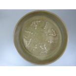 RU - WARE - Celadon glazed shallow bowl. Lightly decorated in relief to middle of bowl with figures.