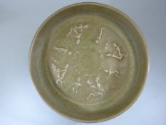 RU - WARE - Celadon glazed shallow bowl. Lightly decorated in relief to middle of bowl with figures.