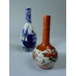 Small blue and white oriental bud vase along with a Satsuma style bud vase.