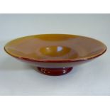 Early Carter Poole Pottery Crimson Lustre bowl. The base hand signed 'Lustre Poole' and a signature.