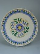 Wedgwood of Etruria and Barlaston hand painted 'Moonstone' charger decorated with flora. Approx 31.