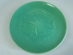 Wedgwood Veronese Tazza with incised floral design on a green ground.Approx 23cm Diameter.