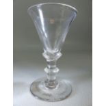 Early Georgian wine glass on banded stem. Approx height 10.5cm