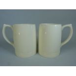 Keith Murray for Wedgwood pair of Tankards in cream glaze.