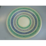 Poole Pottery 1950's Freeform charger decorated in banded purples and greens. approx diameter 33cm