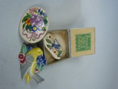 Three Poole Pottery brooches - 1 in original box