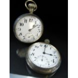 A Pair of matching military issue, open faced keyless wind, pocket watches. The case backs inscribed