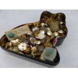 Tray containing military buttons and badges along with German and french