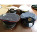 MILITARIA - Four military peaked caps