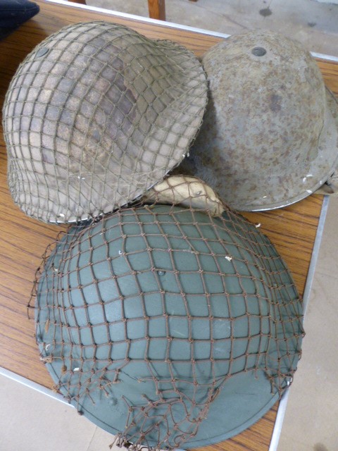 MILITARIA - Three military helmets