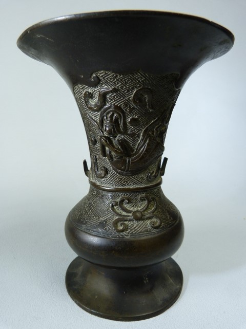 Oriental Bronze fluted vase carved in relief with Foo Dog and warrior with sword. Small amount of - Image 2 of 3