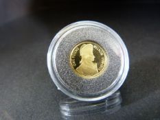 A GOLD UNC NELSON COMMEMORATIVE PIECE. An Alderney One Pound 2005 dated gold piece commemorating