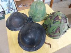 MILITARIA - Four military war helmets