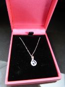 18ct white gold Sapphire and diamond pendant necklace on gold chain