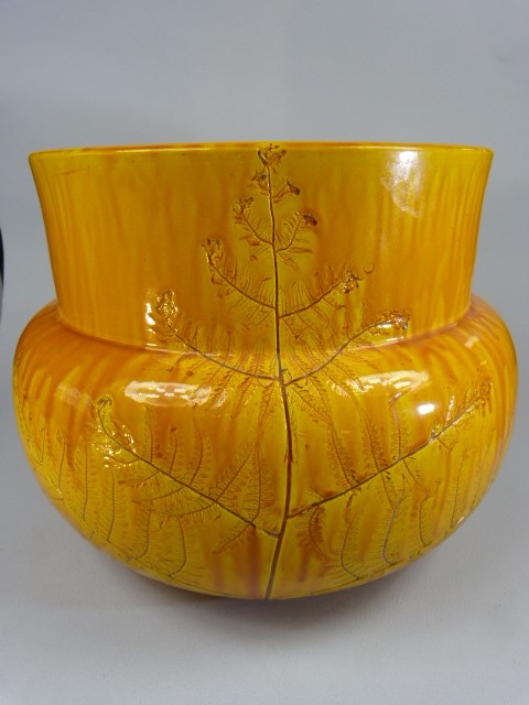 Wemyss bright ochre Jardiniere - impressed mark to base. Decorated lightly with foliage.