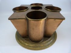 A FOUR-BOTTLE COPPER WINE COOLER, with brass carrying handles and brass cover for ice receptacle,