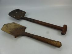 Two wooden handled military spades. One marked to blade 'Thomas 1900'