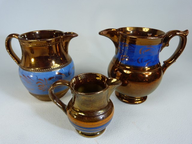 Victorian copper lustre jugs of varying sizes. (6) - Image 2 of 5