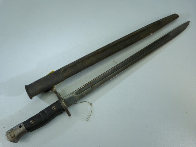 WW1 US 1918 Remington Bayonet. Stamped to blade and with leather and metal scabbard 43cm