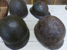 MILITARIA - Four military helmets