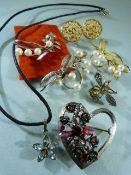 Selection of costume jewellery brooches etc