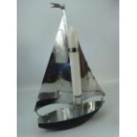 Vintage light in the form of a chrome ship