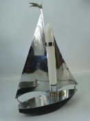 Vintage light in the form of a chrome ship