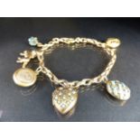 9ct gold charm bracelet with six gold coloured charms