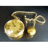 An 18ct gold open face pocket watch, the gilt dial with Roman numerals, the case with foliate