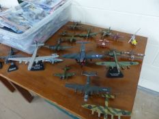 A quantity of Diecast Aircraft Models - 22 Air Combat Collection bagged with magazine, 21 Diecast