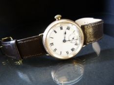 Gold coloured wrist watch with enamelled dial and second hand dial