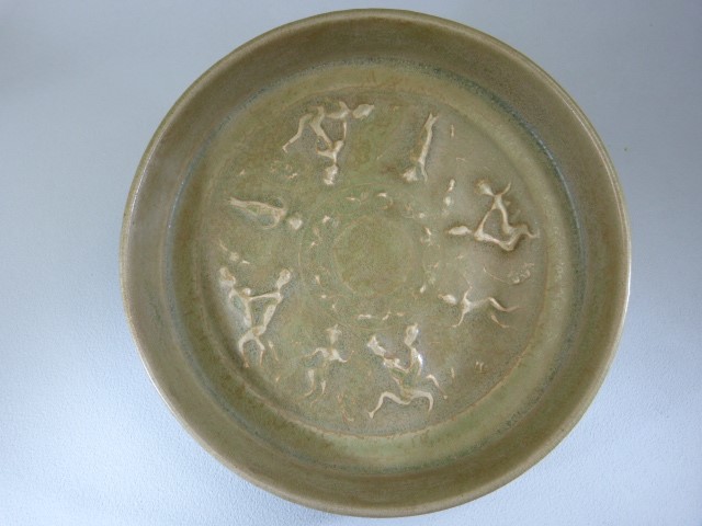 RU - WARE - Celadon glazed shallow bowl. Lightly decorated in relief to middle of bowl with figures.