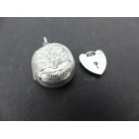 Silver locket and a silver padlock