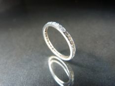 Eternity ring: A 18ct white gold Diamond FULL Eternity ring of approx 70pts