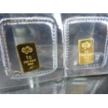 Two sealed gold ingots both marked 1g FINE GOLD 999.9