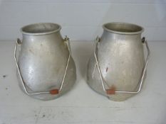 Two vintage milk churns