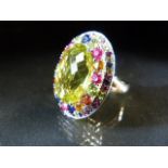 18ct White Gold multi coloured Gem stone ring. Large oval lemon yellow stone in the centre measuring